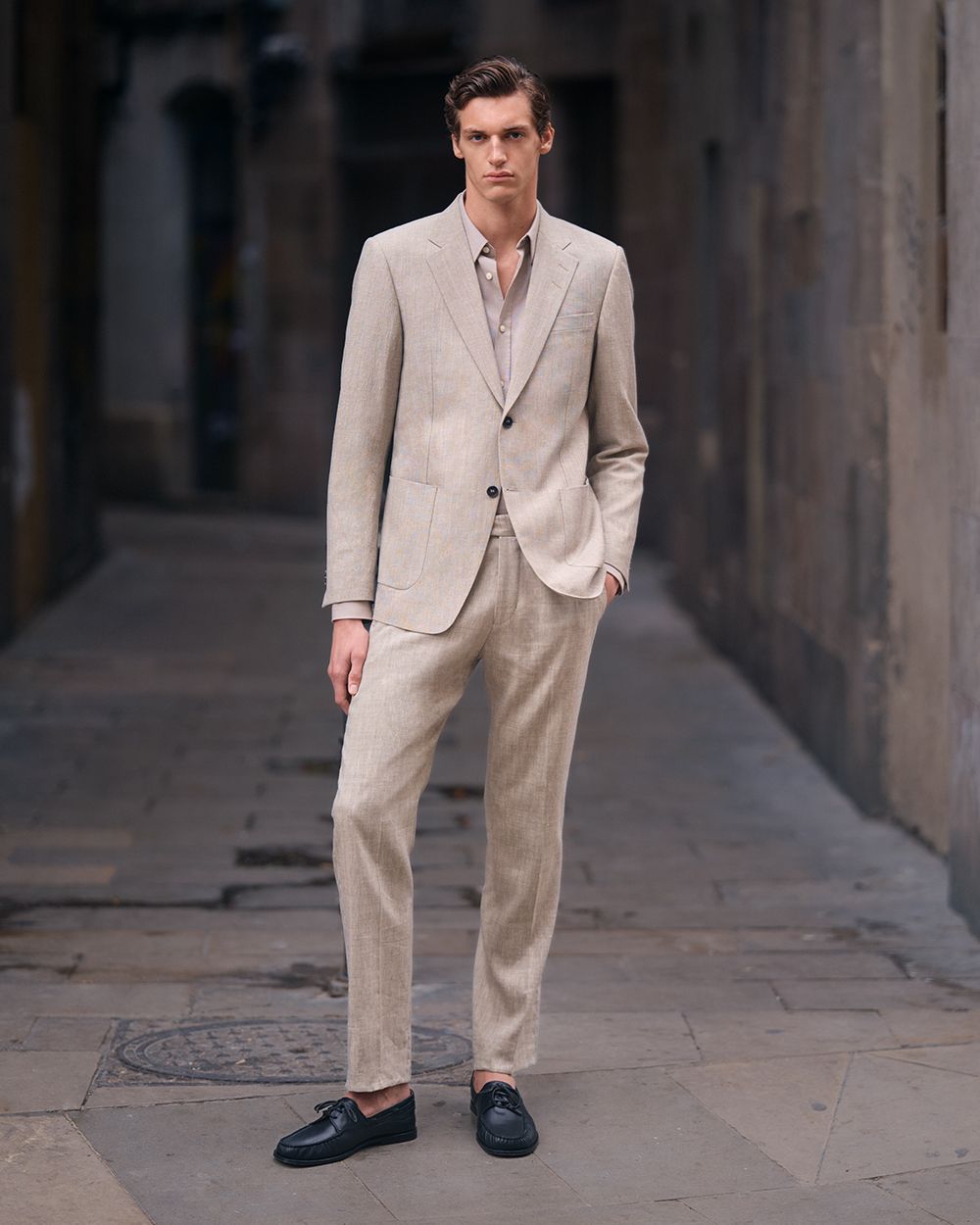 Man in beige linen suit