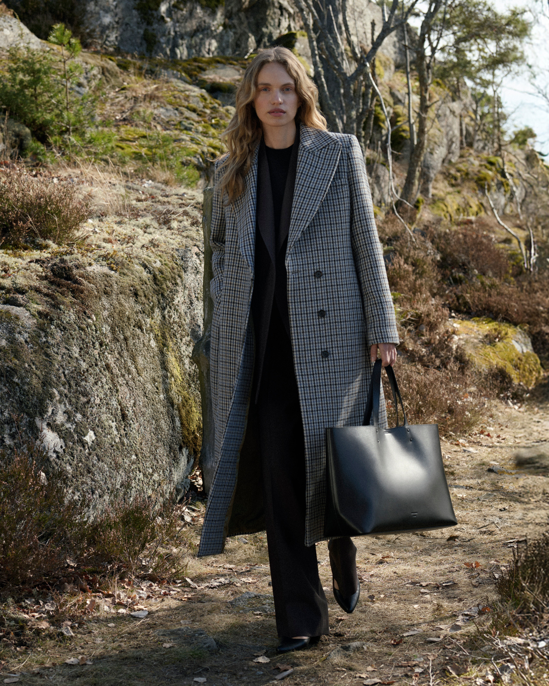 Woman in long coat