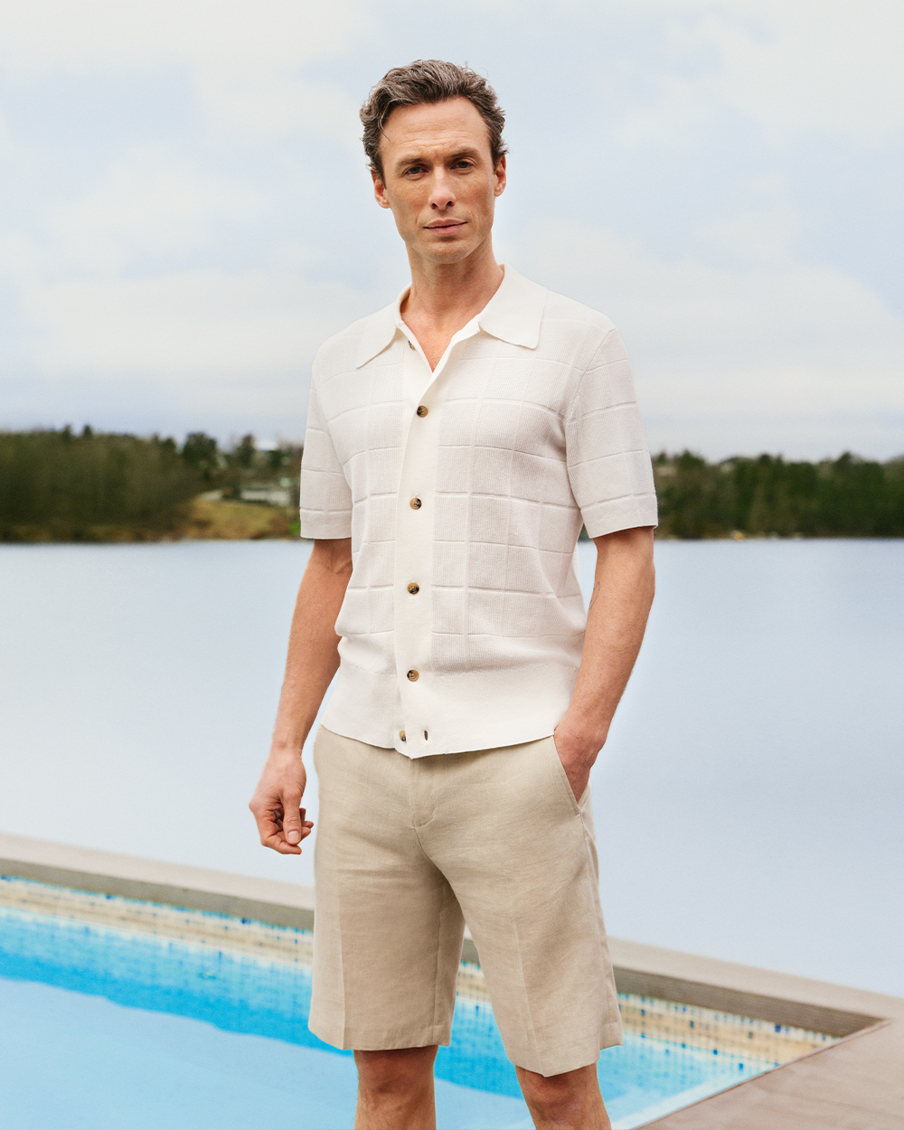 Male Model in Tiger of Sweden Black Summer Suit