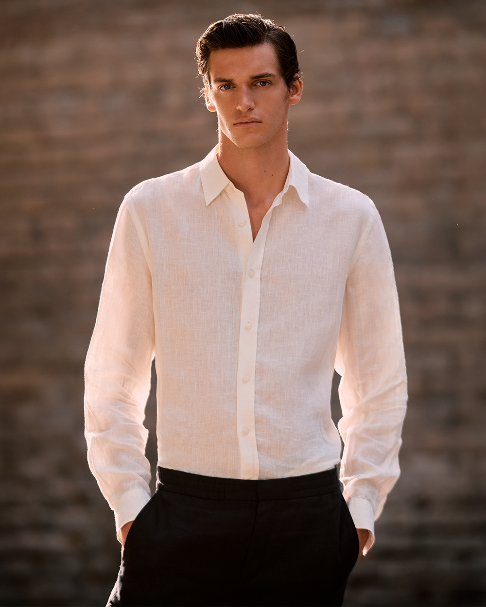 Man in white linen shirt